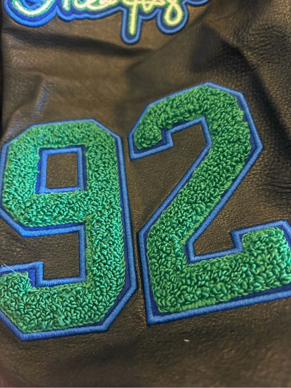 Jordan Black Bomber Jacket with Green Air Jordan Patch
